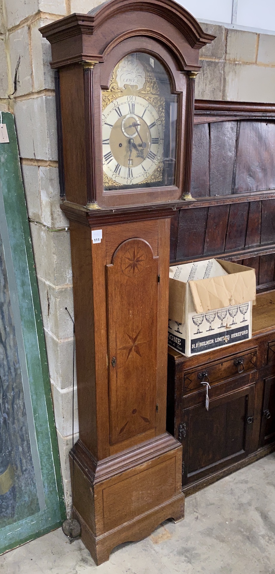 An early 19th century inlaid oak eight day longcase clock by Thomas Best, Lewes (no weights), height 211cm